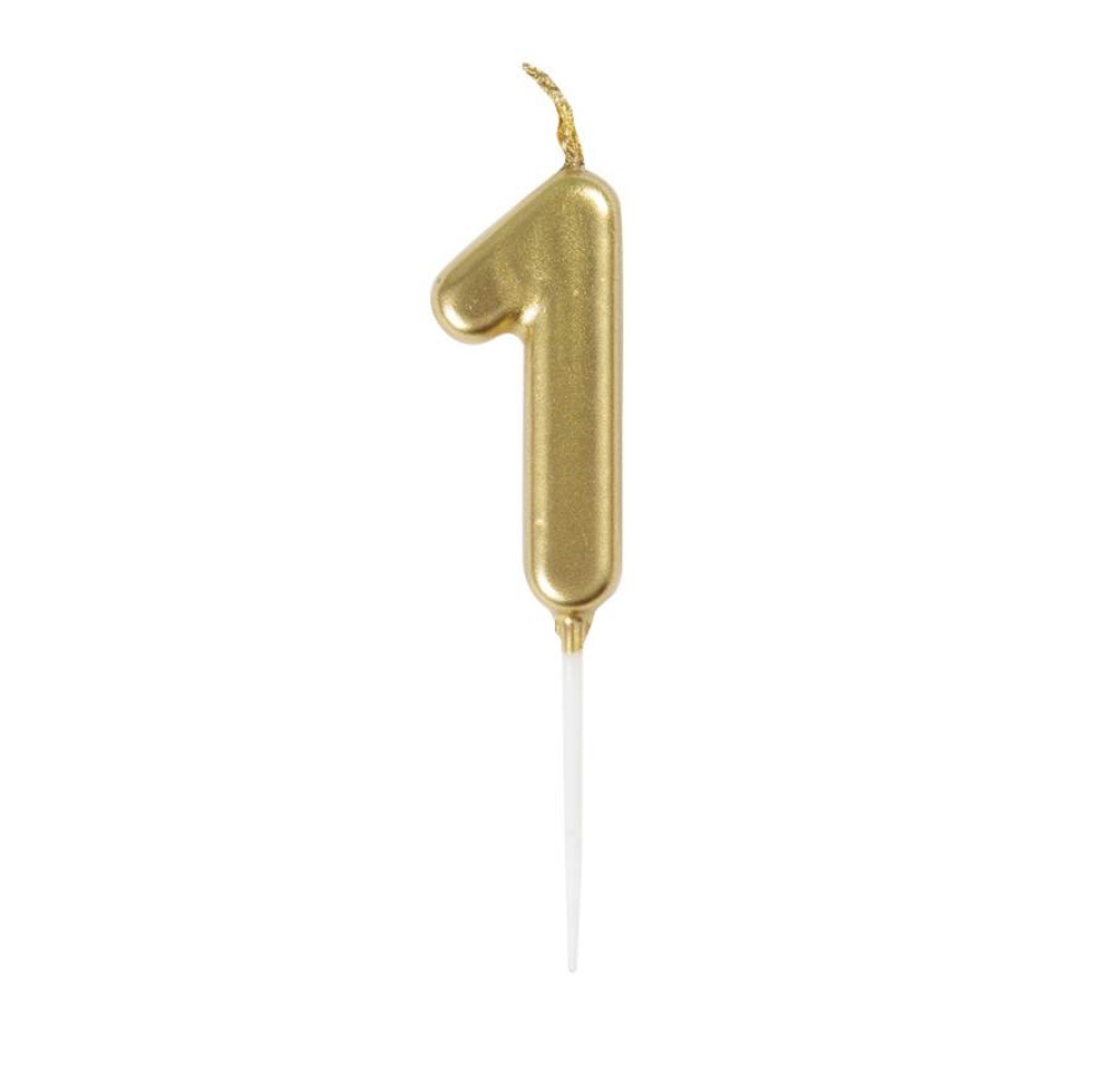 Mini metallic gold number 1 birthday pick candle displayed on cake in Manahawkin, NJ celebration setup