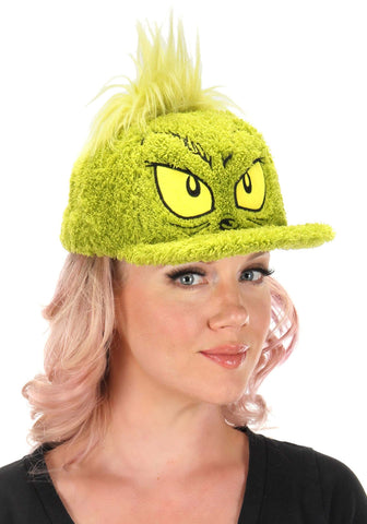Women wearing Front view of Dr. Seuss Grinch Fuzzy Cap showing detailed embroidered facial features and soft textured fabric