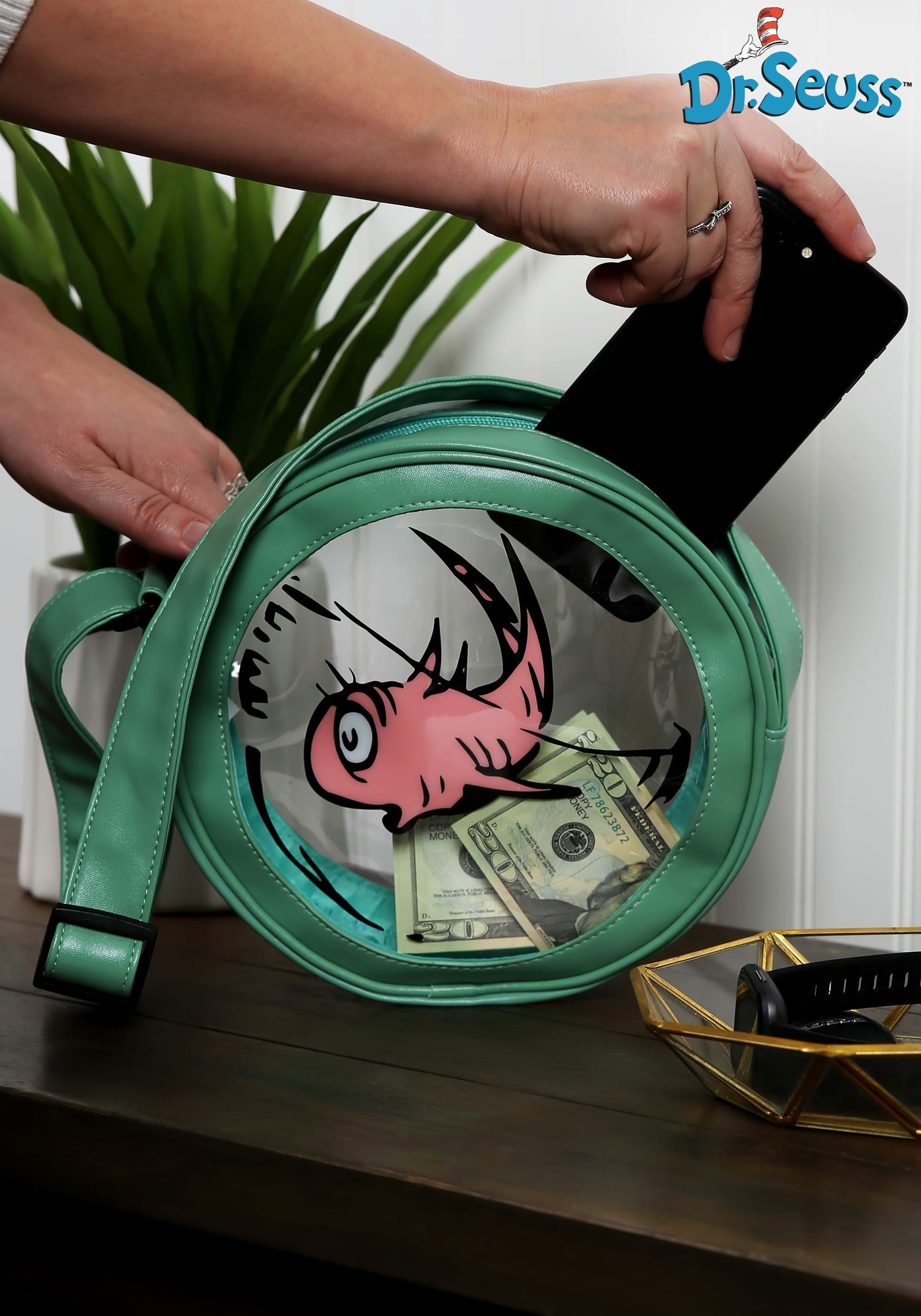 The Officially licensed Dr. Seuss Cat in the Hat Fish Companion costume purse showing it functionality and relative size
