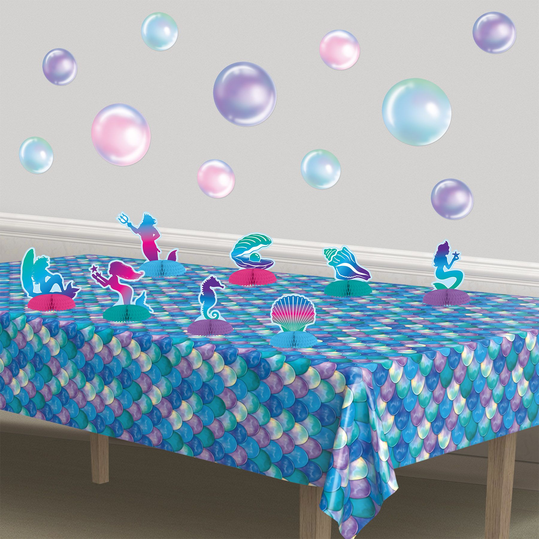 Mermaid themed table setup with mini centerpieces for luau and beach party