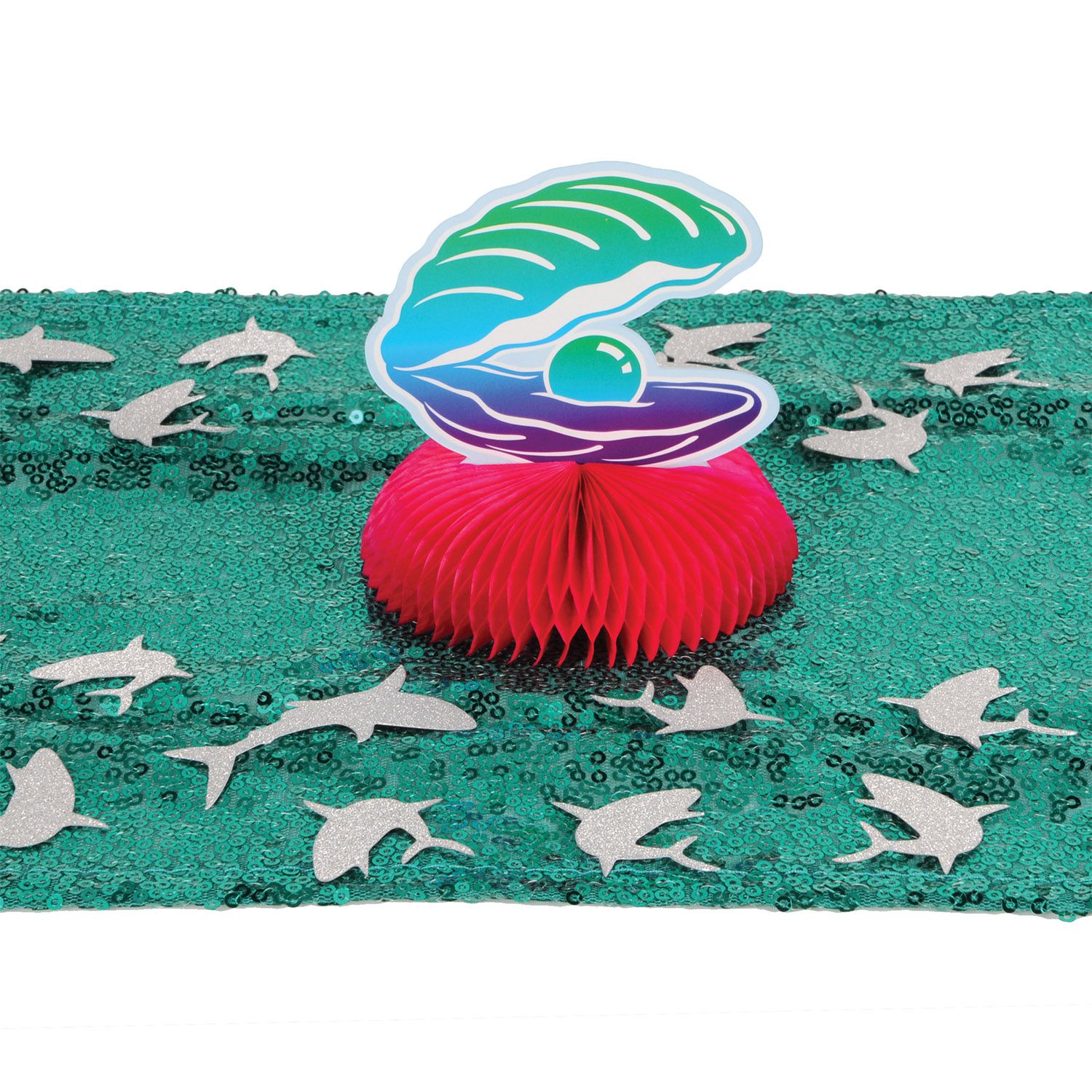 Shark confetti scattered on party table for Shark Week or beach party décor