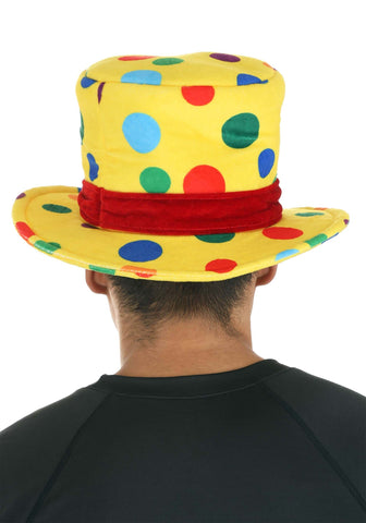 Close-up rear view of person wearing foam-backed yellow polka dot hat with red velour ribbon.