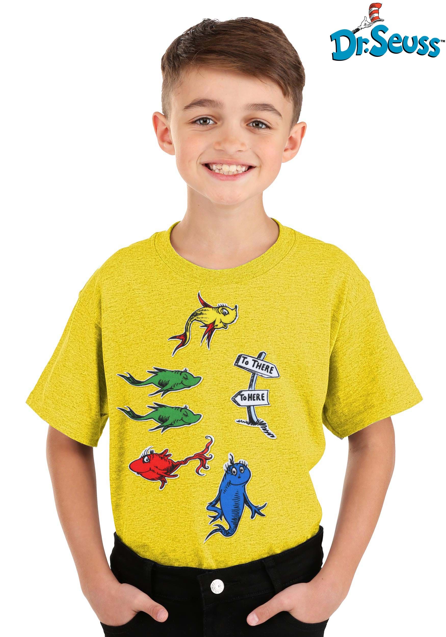 Child wearing a yellow t-shirt with Dr. Seuss One Fish Two Fish Patch Set, Official Dr. Seuss logo visible.