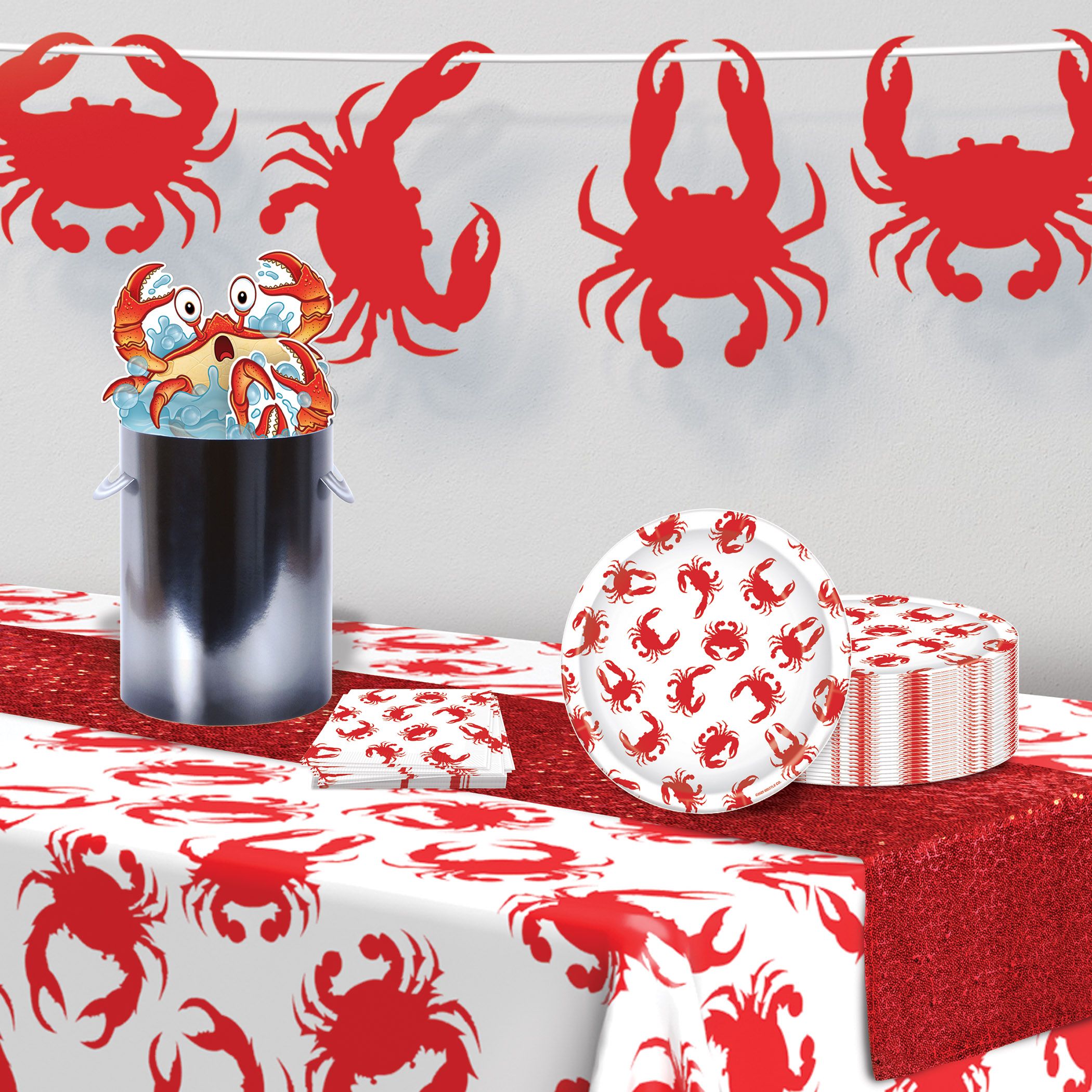 Coastal themed crab plates styled for beach BBQ and summer party table setup