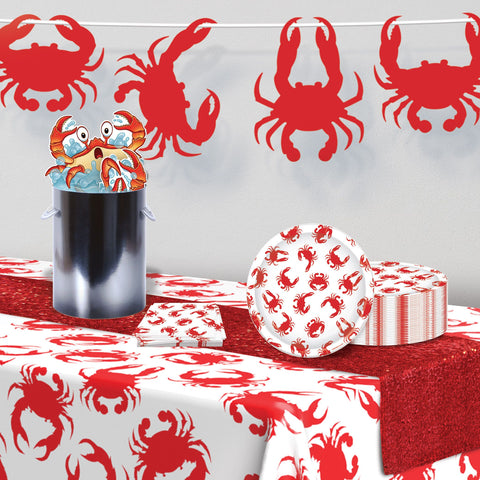 Coastal themed crab plates styled for beach BBQ and summer party table setup