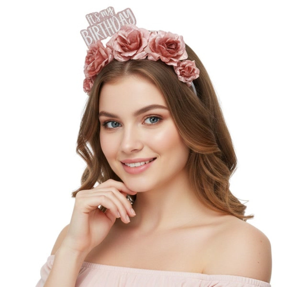 Rose Gold Birthday Headband with an “It’s My Birthday” caption and rose gold metallic floral fabric adornments in Manahawkin, NJ at Party Fair.