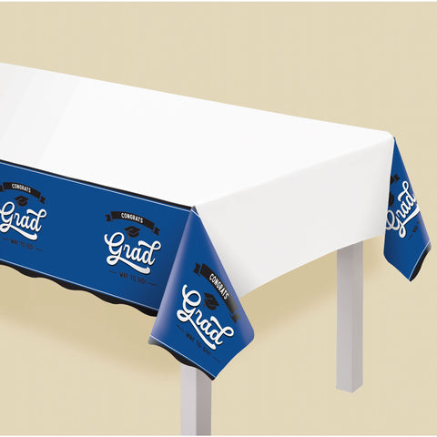 Blue graduation plastic table cover 54x102 from Party Fair in Manahawkin NJ displayed on party table