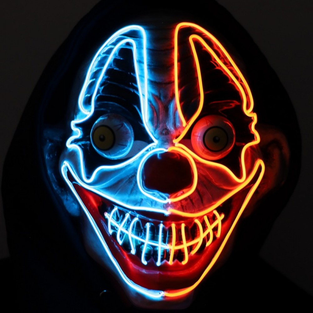 Light-Up Neon Evil Clown Mask displaying its glowing facial outlines in a vibrant neon blue and orange. 