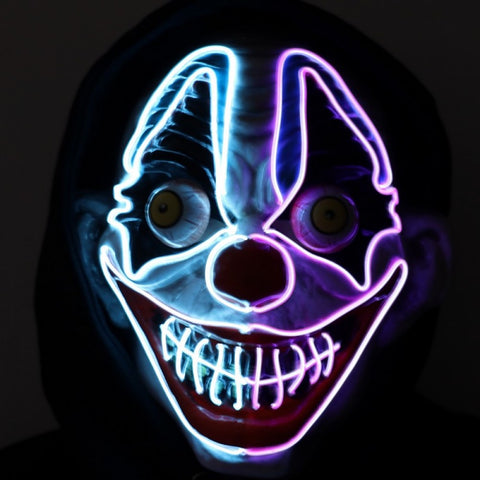 Light-Up Neon Evil Clown Mask displaying its glowing facial outlines in a vibrant neon white and purple.