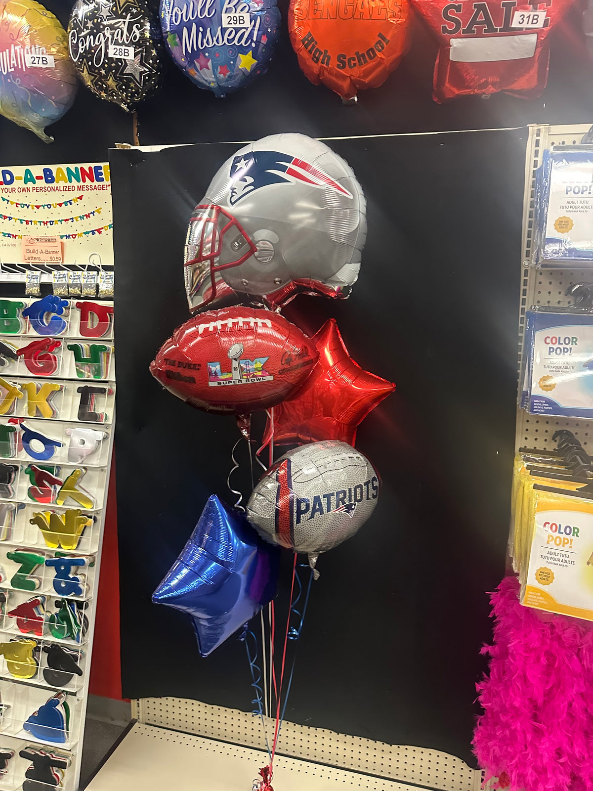 Super Bowl LX New England Patriots Mylar balloon bouquet for party décor in Manahawkin, NJ featuring Patriots helmet, football, and star balloons